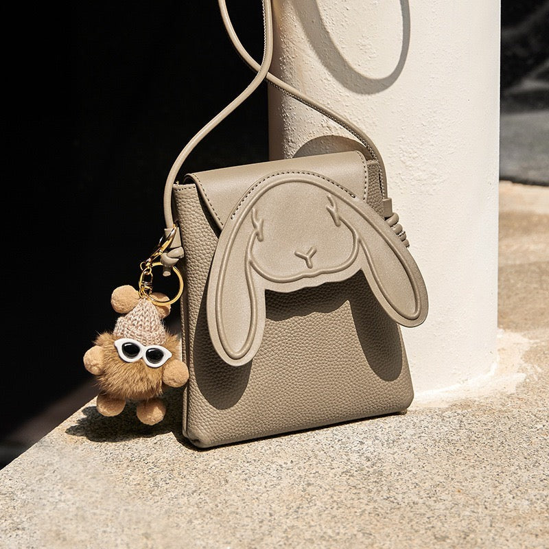 PocketBunny™ – Compact Leather Phone Bag with Charm