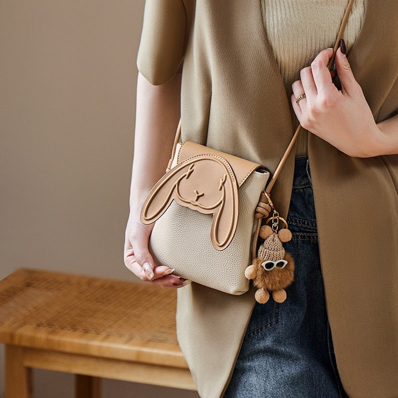 PocketBunny™ – Compact Leather Phone Bag with Charm